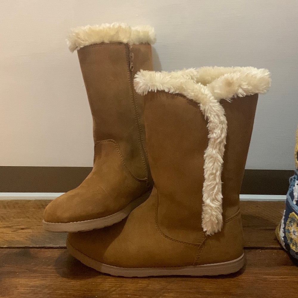 light brown swayed fur lined boots